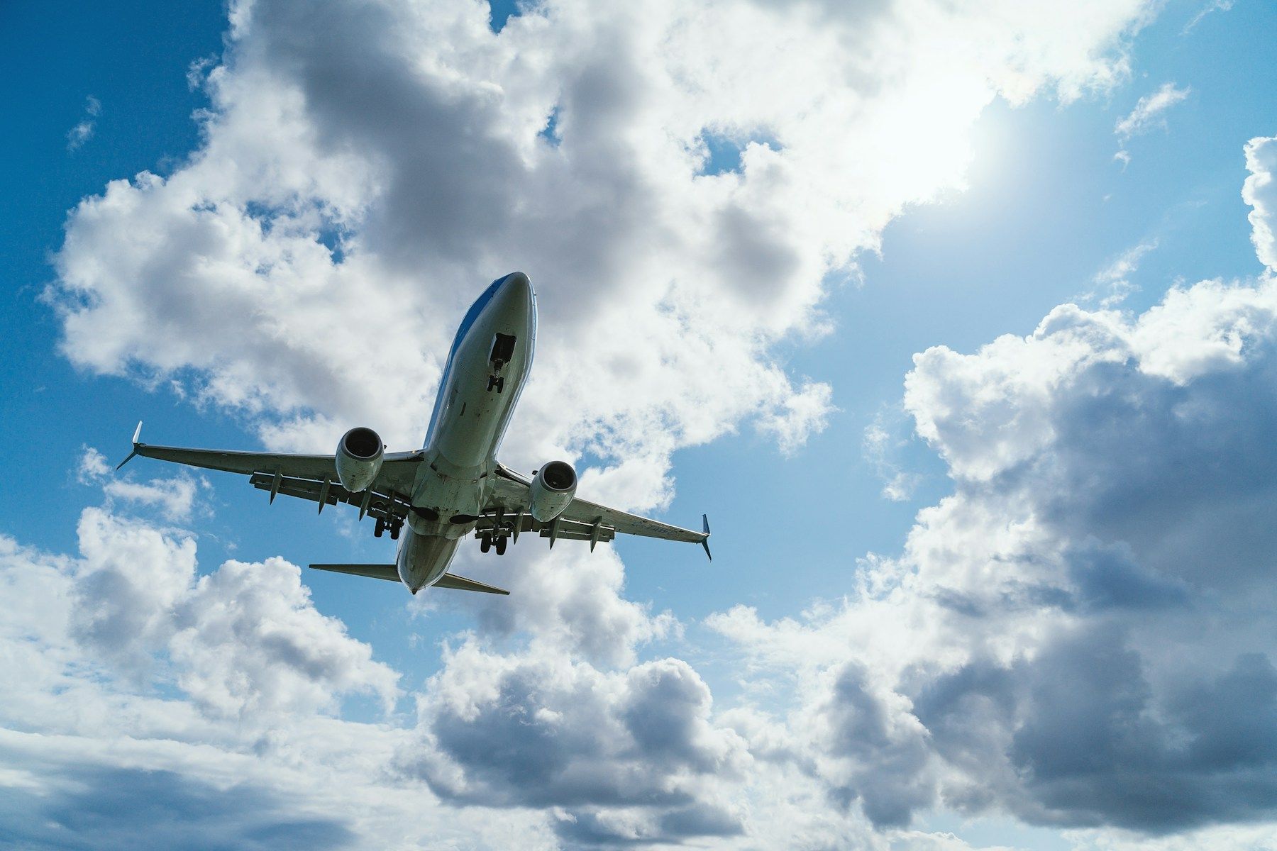 A passenger plane on the runway at sunrise